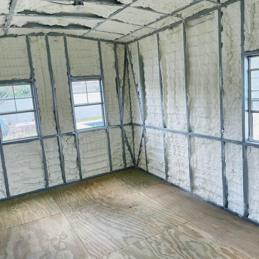 Closed-cell spray foam insulation applied to wall cavities in a residential project in Moores Mill